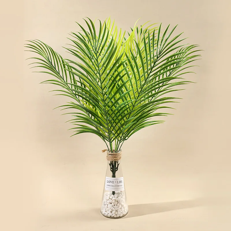 Feuilles tropicales vertes du palmier artificiel