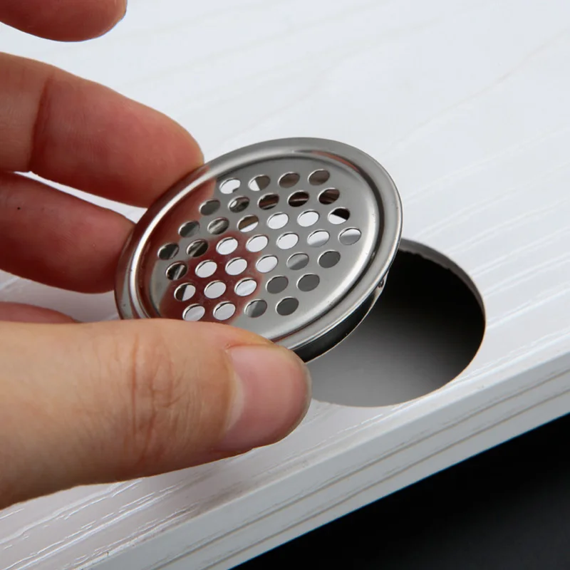 Grille d'aération ronde pour armoire